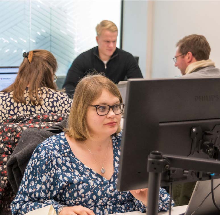 Women staring at her computer.